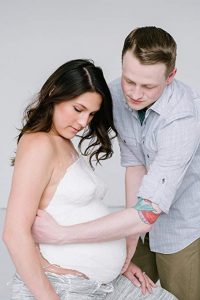 Couple Casting A Baby Bump